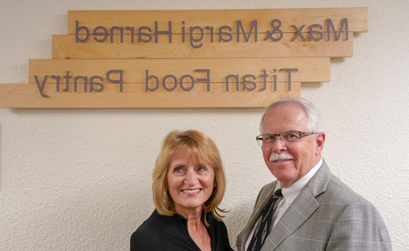 max and margi harned at the food pantry